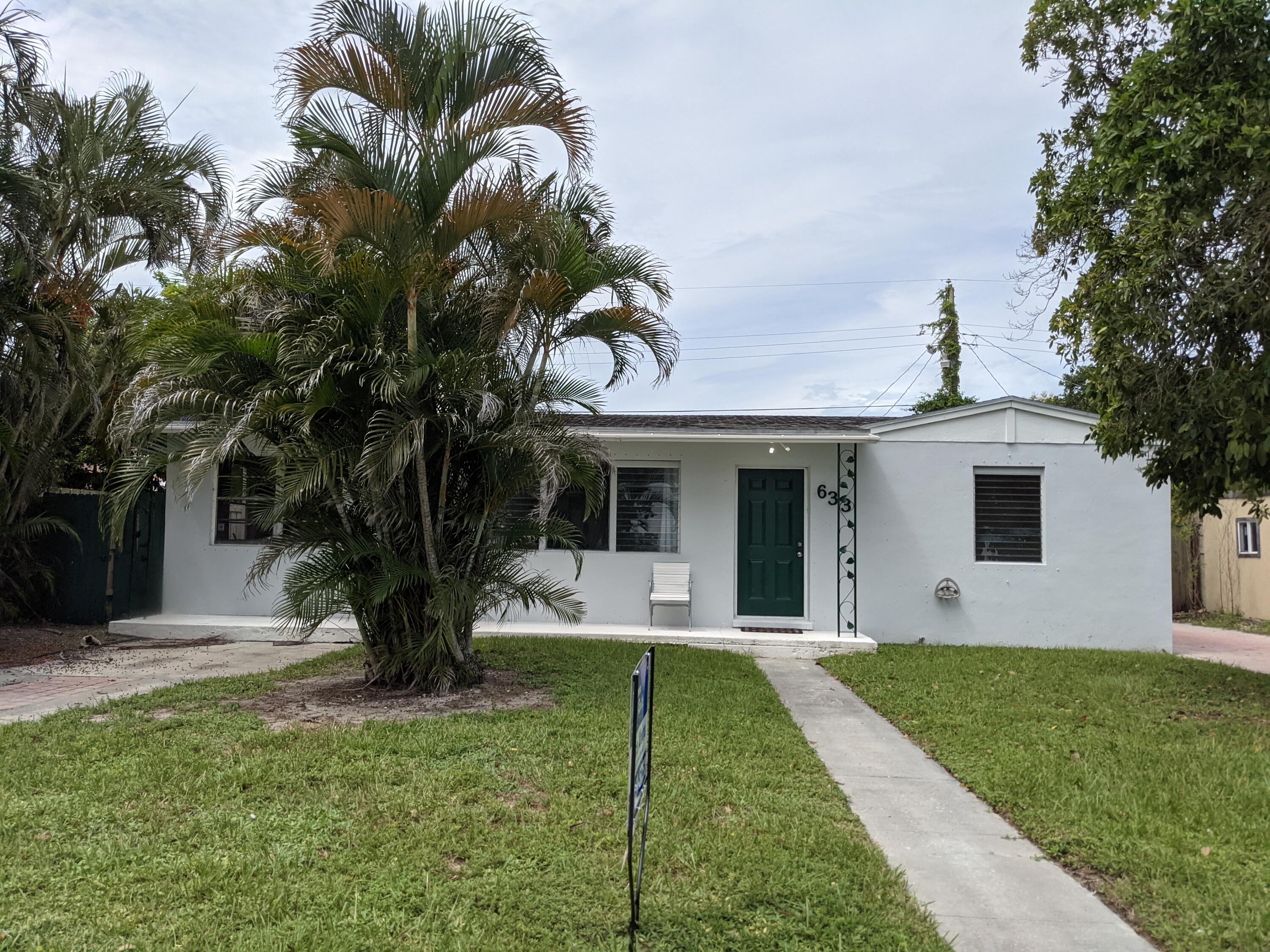 633 Cherry Road West Palm Beach, FL 33409 - Photo 1 of 20 Front