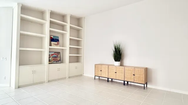 a view of a house with a yard and swimming pool