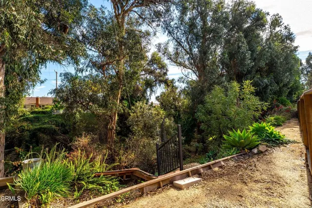 a view of swimming pool with outdoor seating
