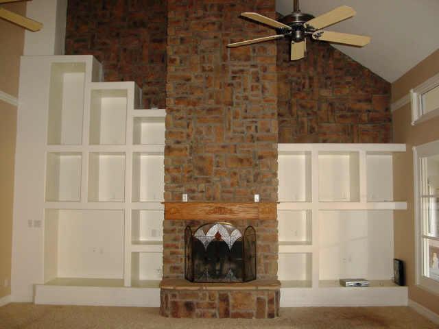 754 East Carver Road Tempe, AZ 85284 - Photo 3 of 6 a living room with a fireplace