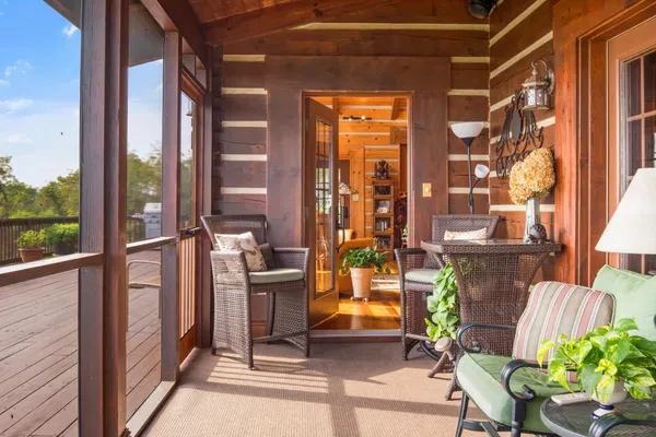 a view of balcony with wooden floor
