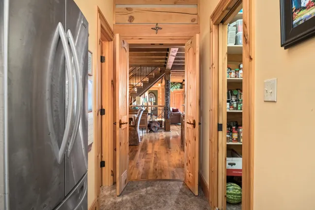 a bed room with a bed and dresser