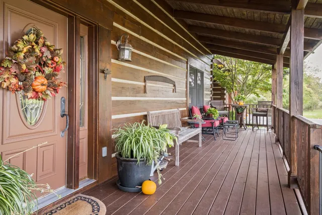 a view of house with a outdoor seating