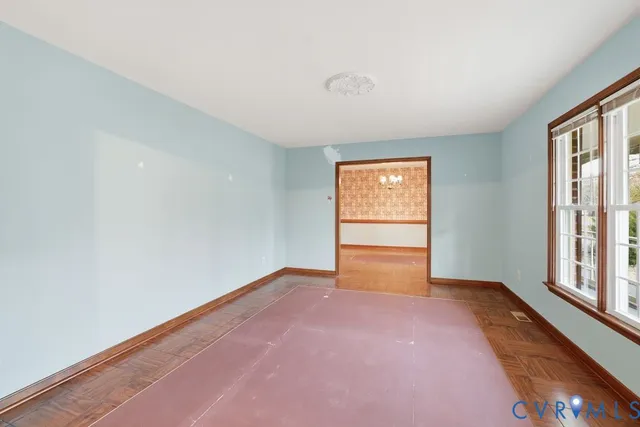 an empty room with windows