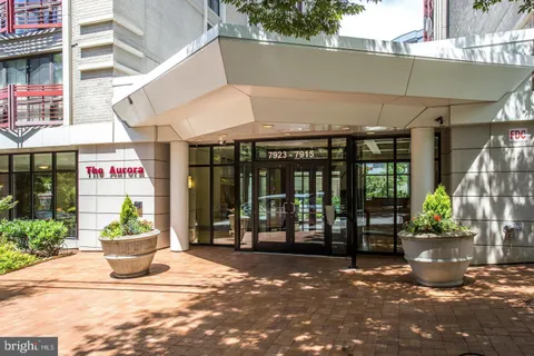 a view of a building with sitting area