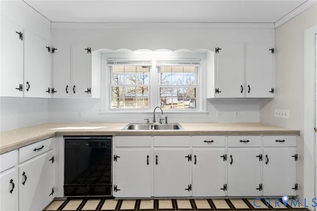 a view of cabinets with wooden floor