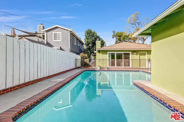 a view of a house with a swimming pool