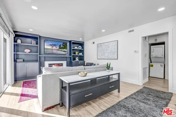 a room with a couch and a table in it