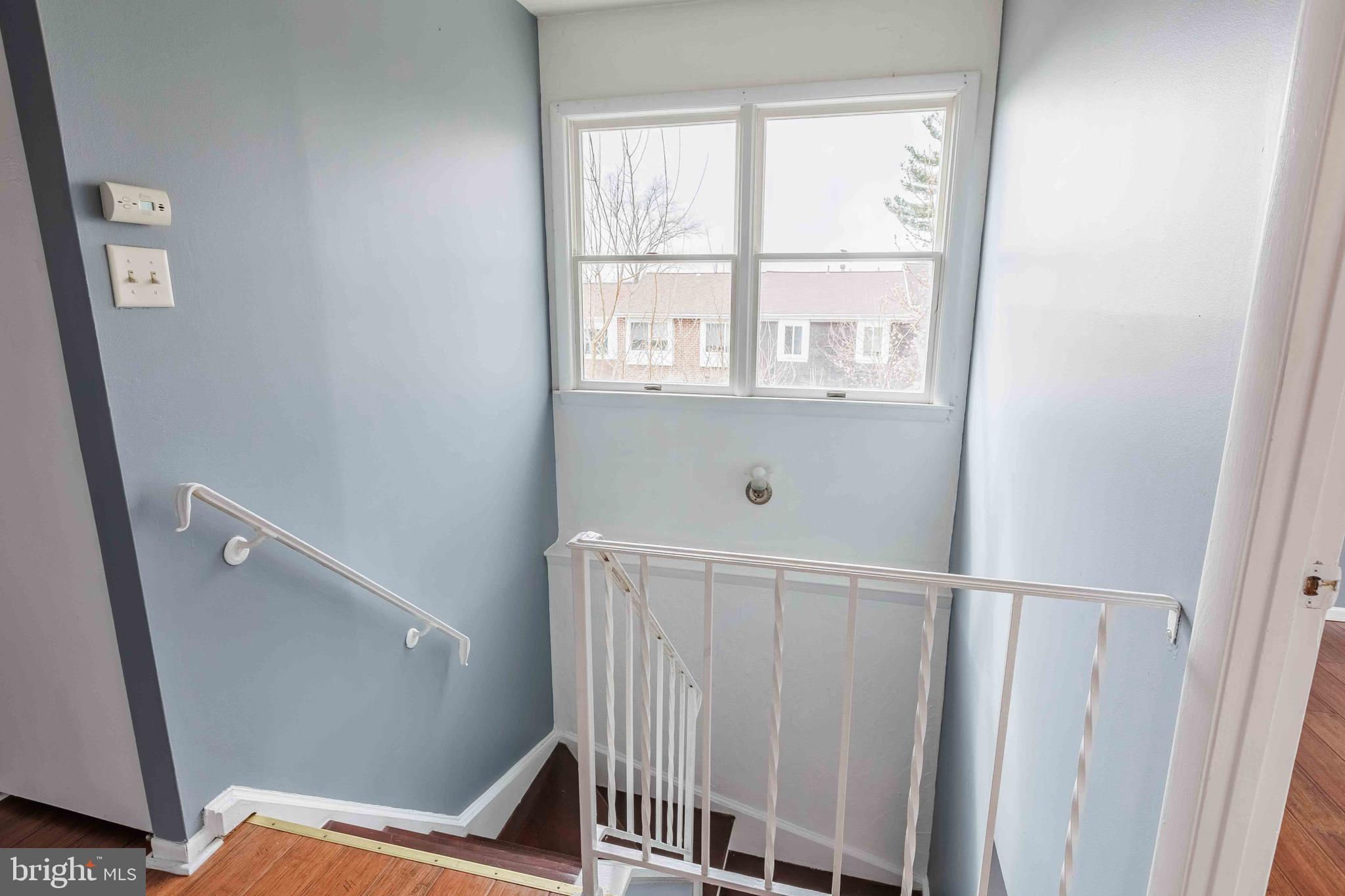 8731 Inquiry Court Walkersville, MD 21793 - Photo 31 of 44 Staircase to main floor