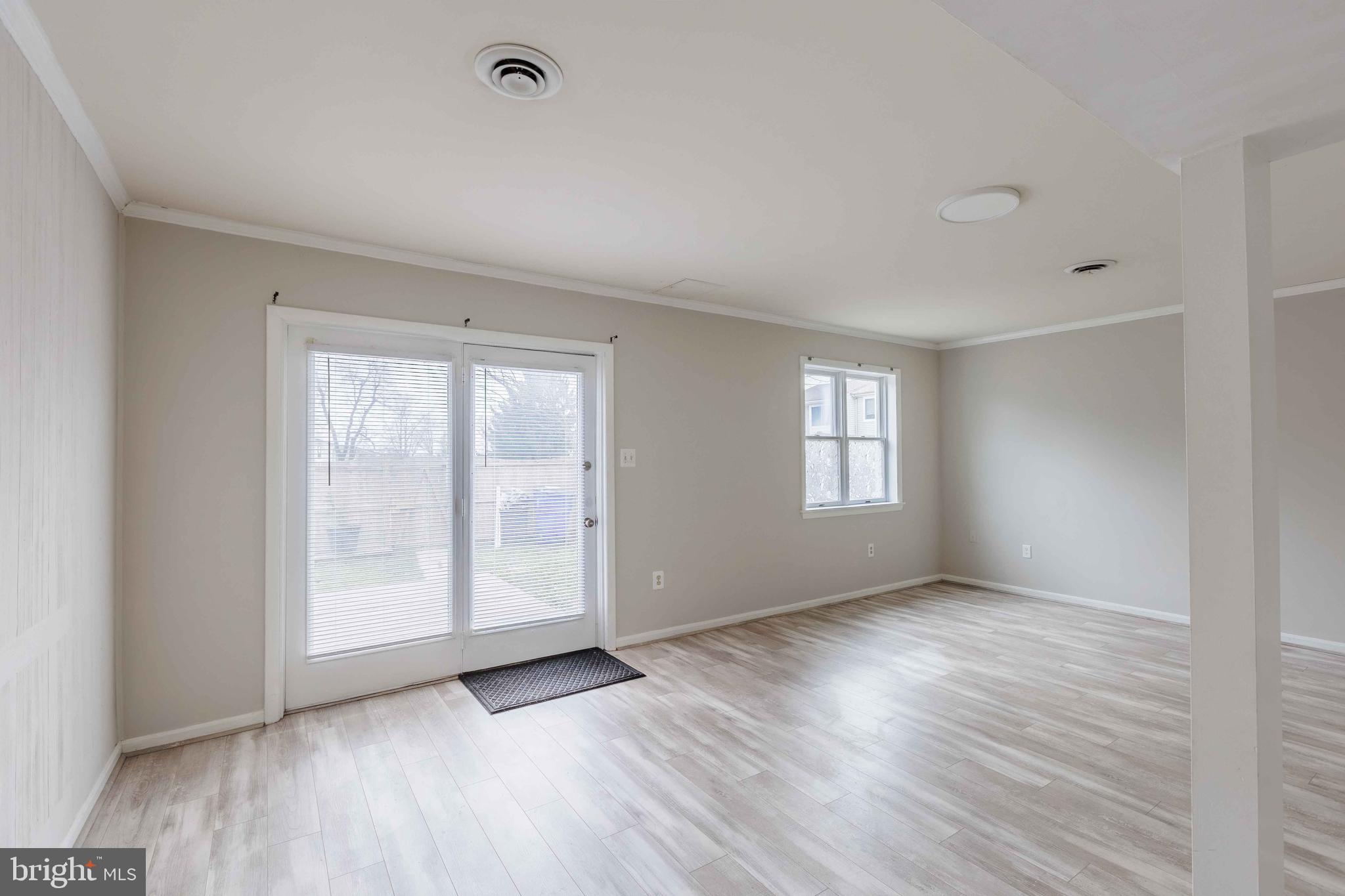 8731 Inquiry Court Walkersville, MD 21793 - Photo 35 of 44 Basement recreation room with exit to backyard