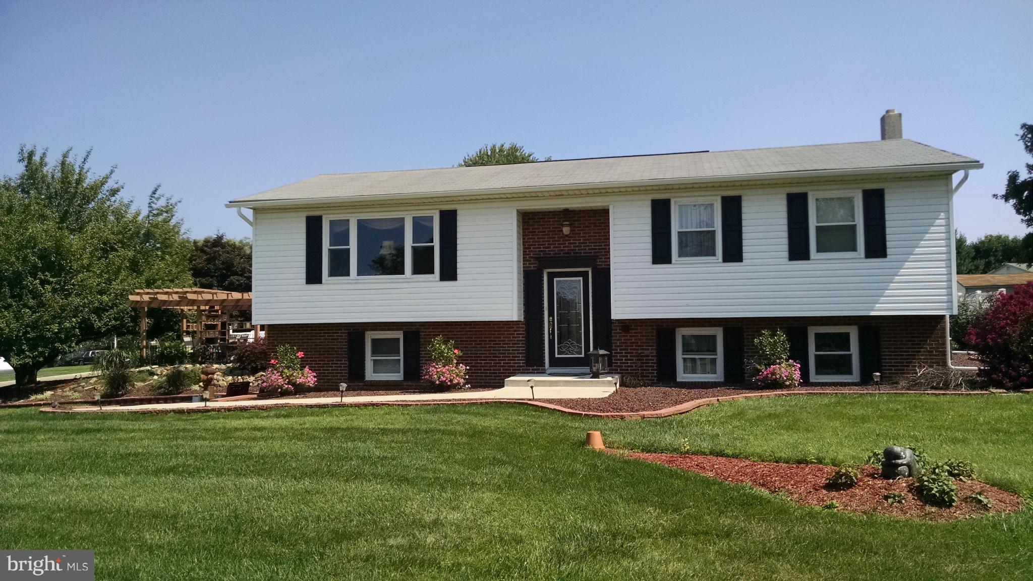 10 Tulip Drive Conowingo, MD 21918 - Photo 2 of 29 a front view of a house with a yard