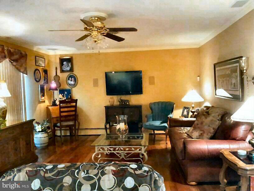 10 Tulip Drive Conowingo, MD 21918 - Photo 15 of 29 a living room with furniture and a flat screen tv