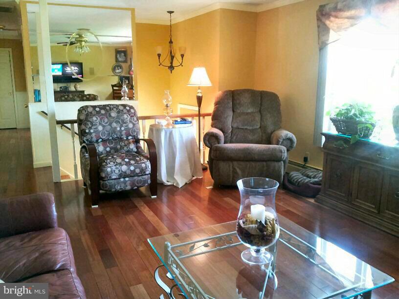 10 Tulip Drive Conowingo, MD 21918 - Photo 16 of 29 a living room with furniture and wooden floor