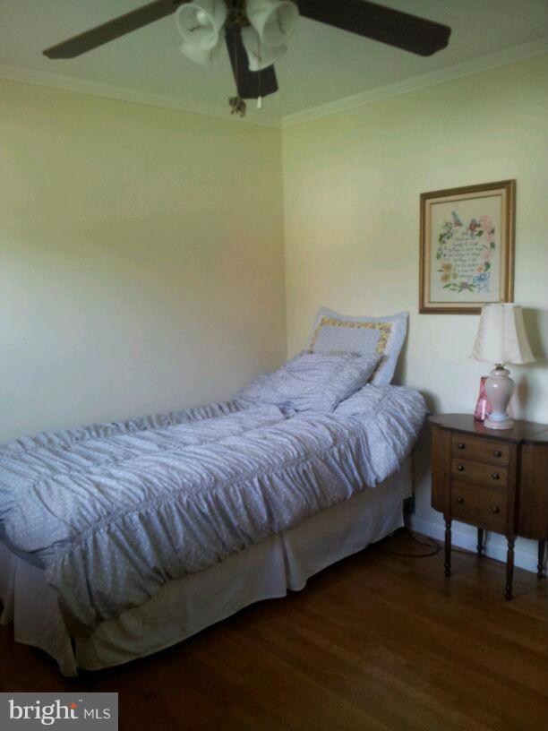 10 Tulip Drive Conowingo, MD 21918 - Photo 24 of 29 a bedroom with a bed and a table in it