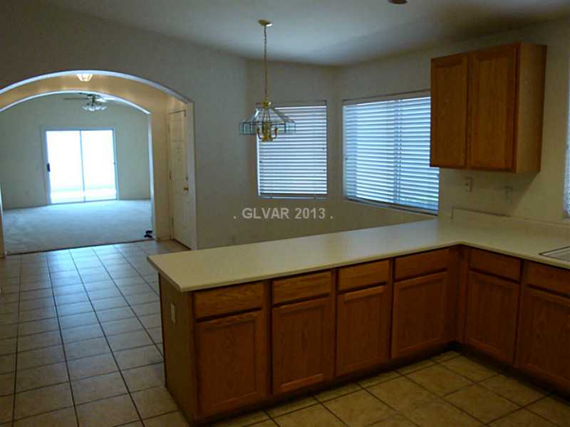 2155 Hidden Ranch Terrace Henderson, NV 89052 - Photo 13 of 23 Property Photo. Looking into Living Room out back door