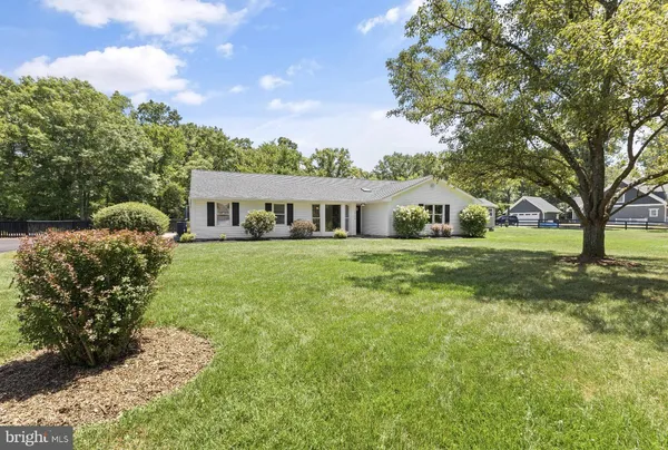 a house view with a garden space