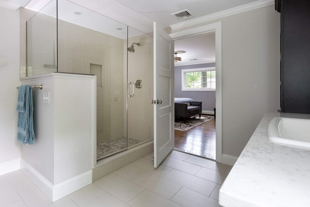 25 Plowgate Road Brookline, MA 02467 - Photo 11 of 19 a bathroom with a tub and a shower