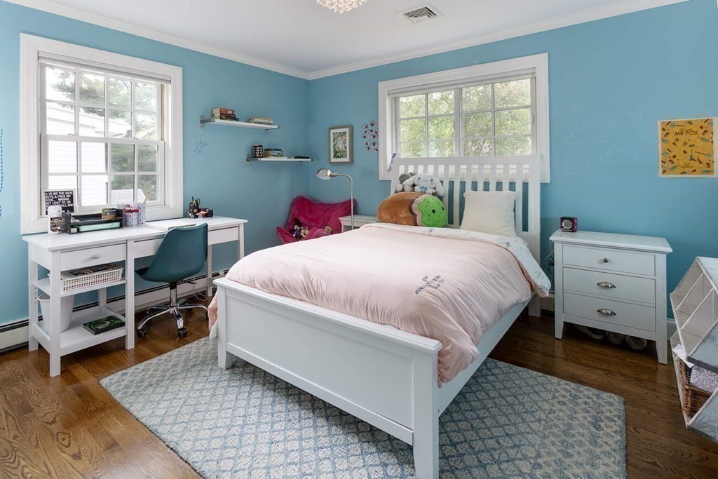 25 Plowgate Road Brookline, MA 02467 - Photo 12 of 19 a bed room with a bed and a window