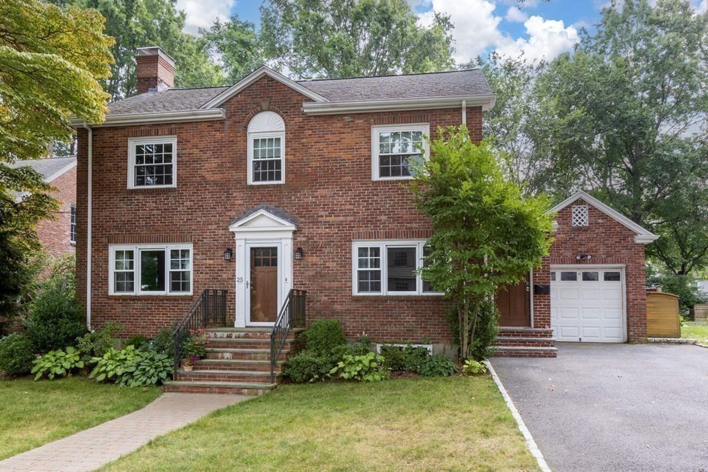 25 Plowgate Road Brookline, MA 02467 - Photo 17 of 19 front view of a house with a yard