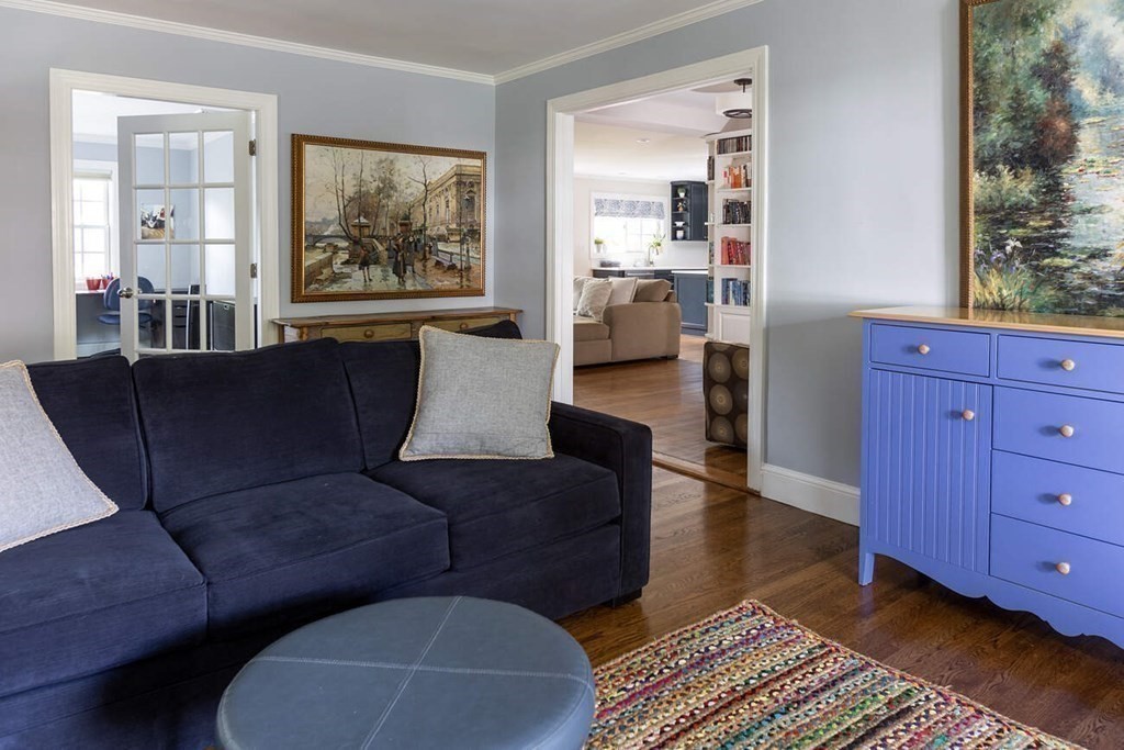 25 Plowgate Road Brookline, MA 02467 - Photo 8 of 19 a living room with furniture and wooden floor