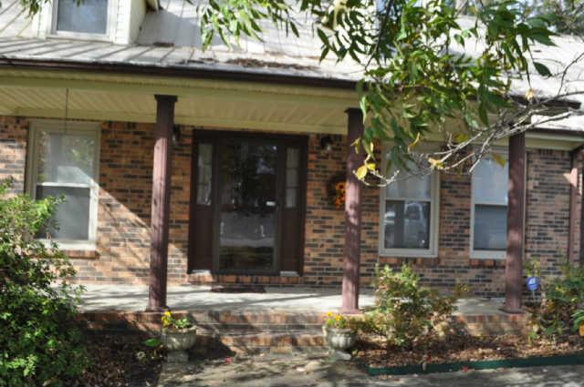 3 Asa Smith Road Ardmore, TN 38449 - Photo 2 of 19 a front view of a house with a yard