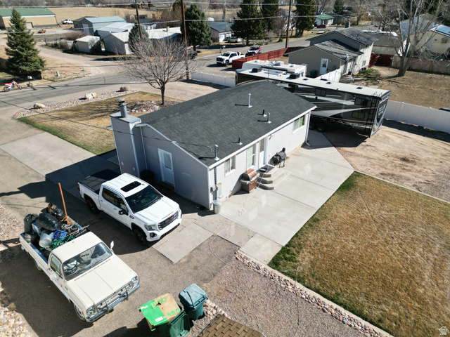 1852 East 3500th Street South Vernal, UT 84078 - Photo 43 of 46 Aerial perspective of south west side of home suburban area
