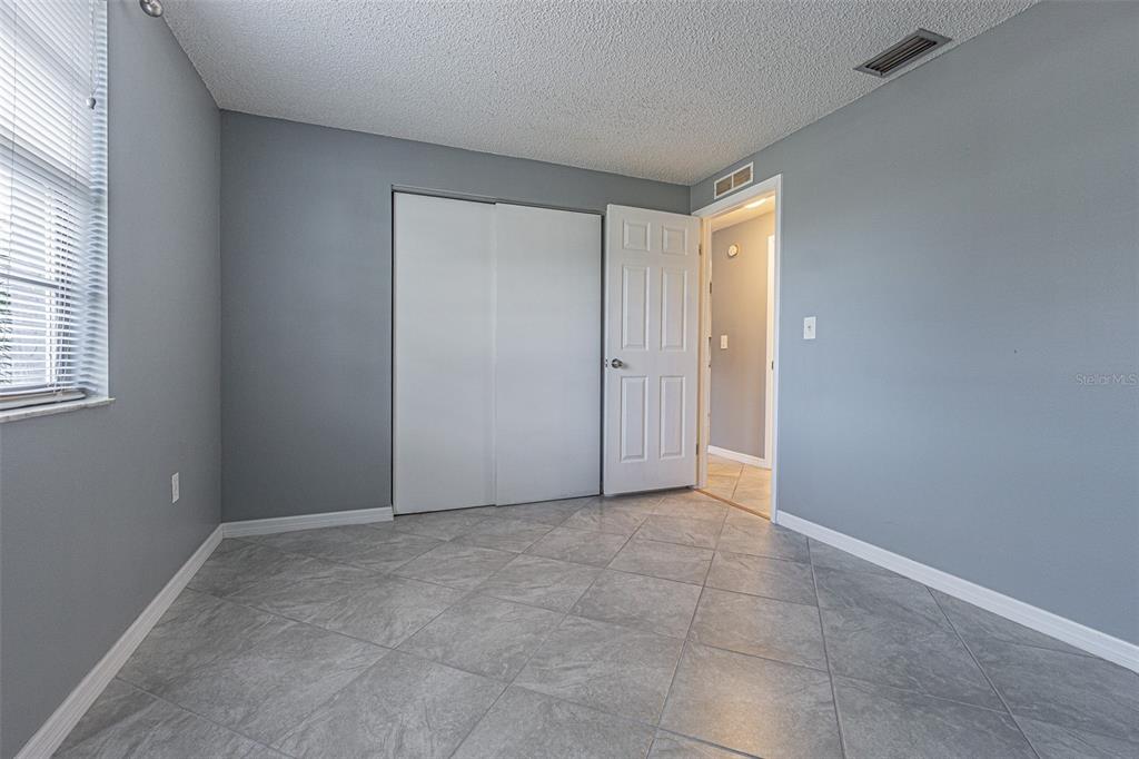 1529 Larkin Road Spring Hill, FL 34608 - Photo 21 of 37 a view of an empty room and window