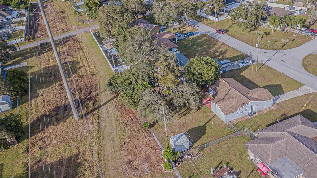 1529 Larkin Road Spring Hill, FL 34608 - Photo 34 of 37 an aerial view of a house with a yard