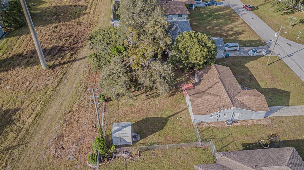 1529 Larkin Road Spring Hill, FL 34608 - Photo 35 of 37 an aerial view of a house with a yard