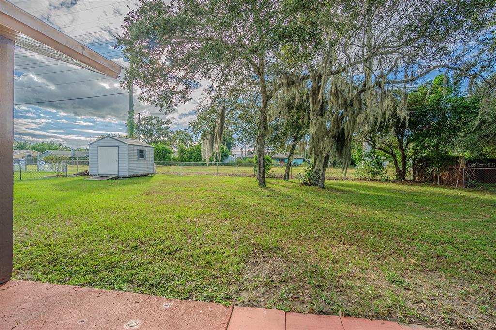 1529 Larkin Road Spring Hill, FL 34608 - Photo 5 of 37 a view of a park with large trees