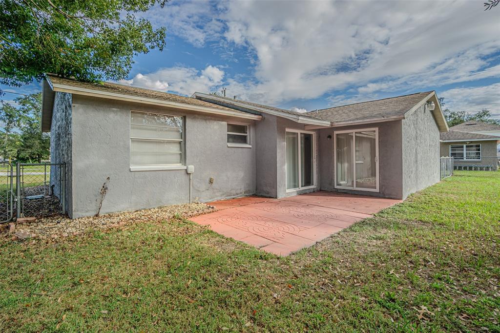 1529 Larkin Road Spring Hill, FL 34608 - Photo 9 of 37 a backyard of a house