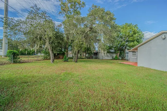 a view of outdoor space with deck and garden