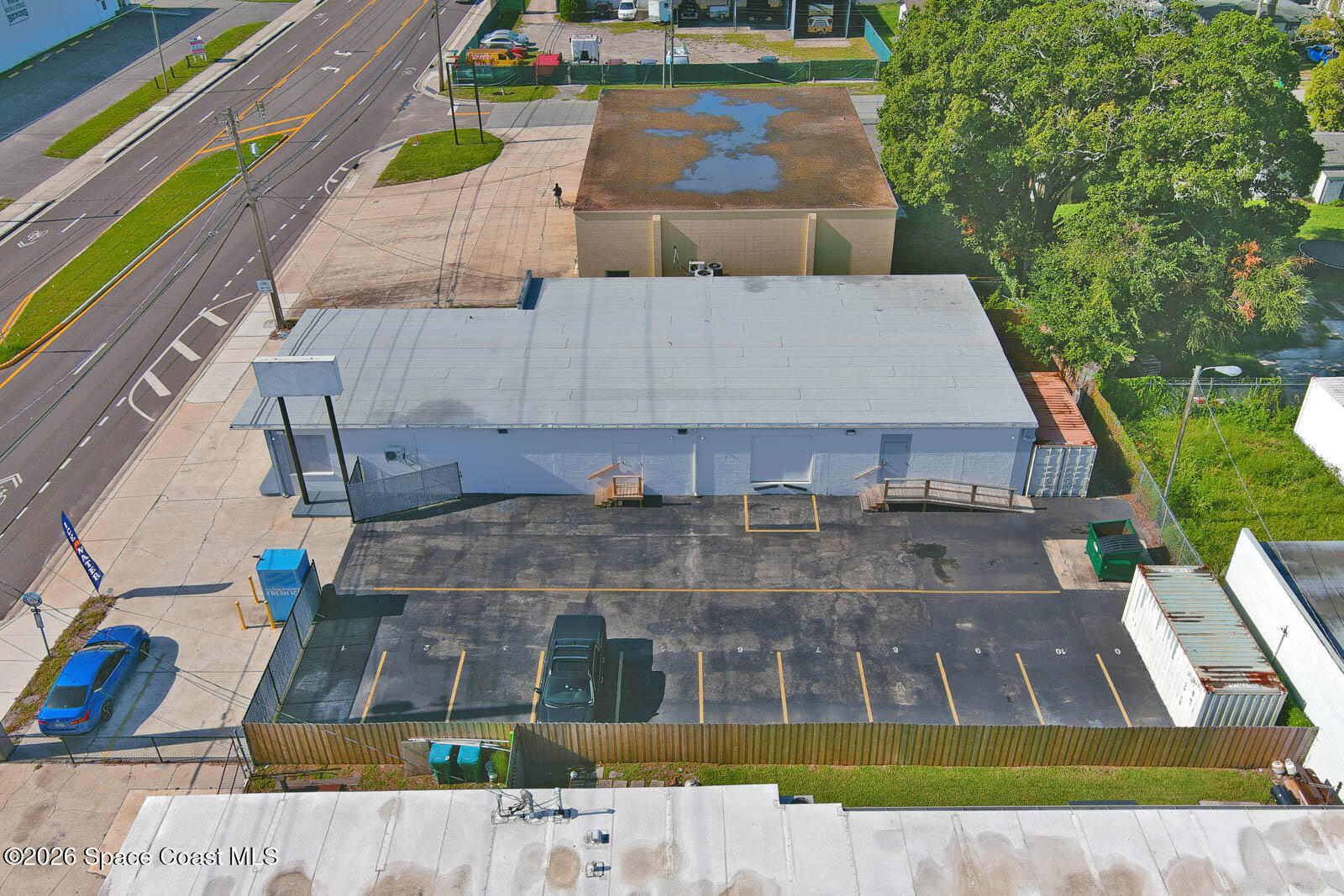 411 Clearlake Road Cocoa, FL 32922 - Photo 19 of 25 an aerial view of a house with swimming pool