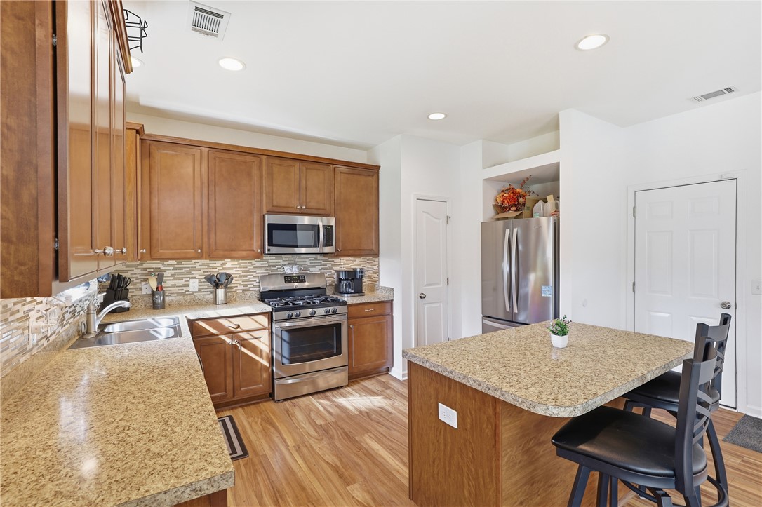 347 Riverdale Road Simpsonville, SC 29680 - Photo 8 of 30 This inviting kitchen combines comfort and style, perfect for everyday living and entertaining.