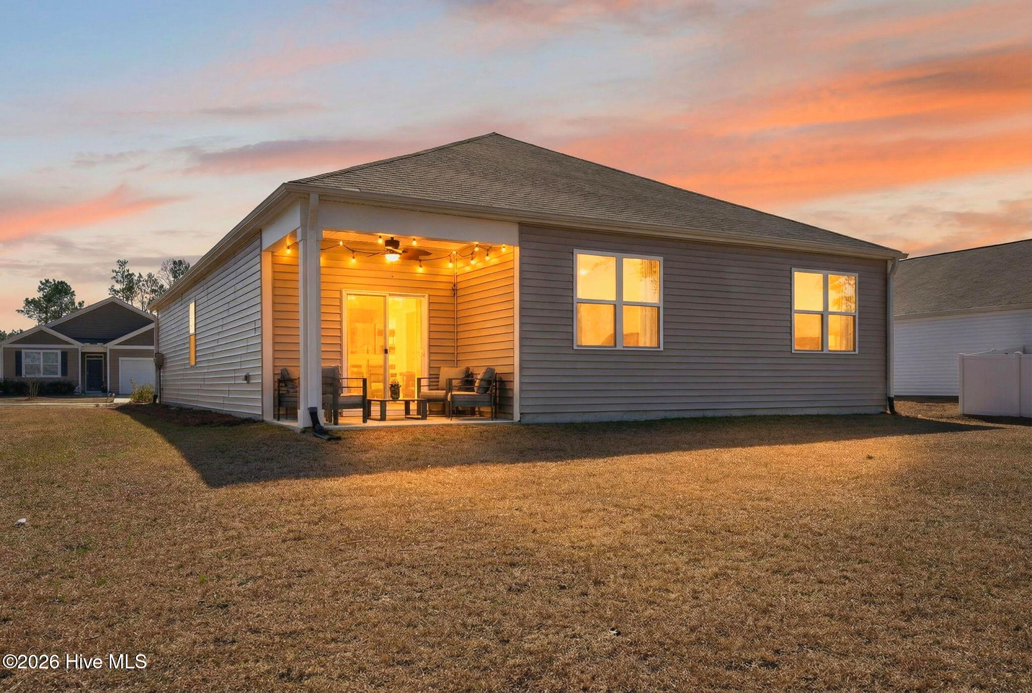 1108 Burled Oak Ridge Loop Southeast, Unit LOT 40 Bolivia, NC 28422 - Photo 30 of 46 Twilight at 1108 Burled Oak Ridge Loop SE