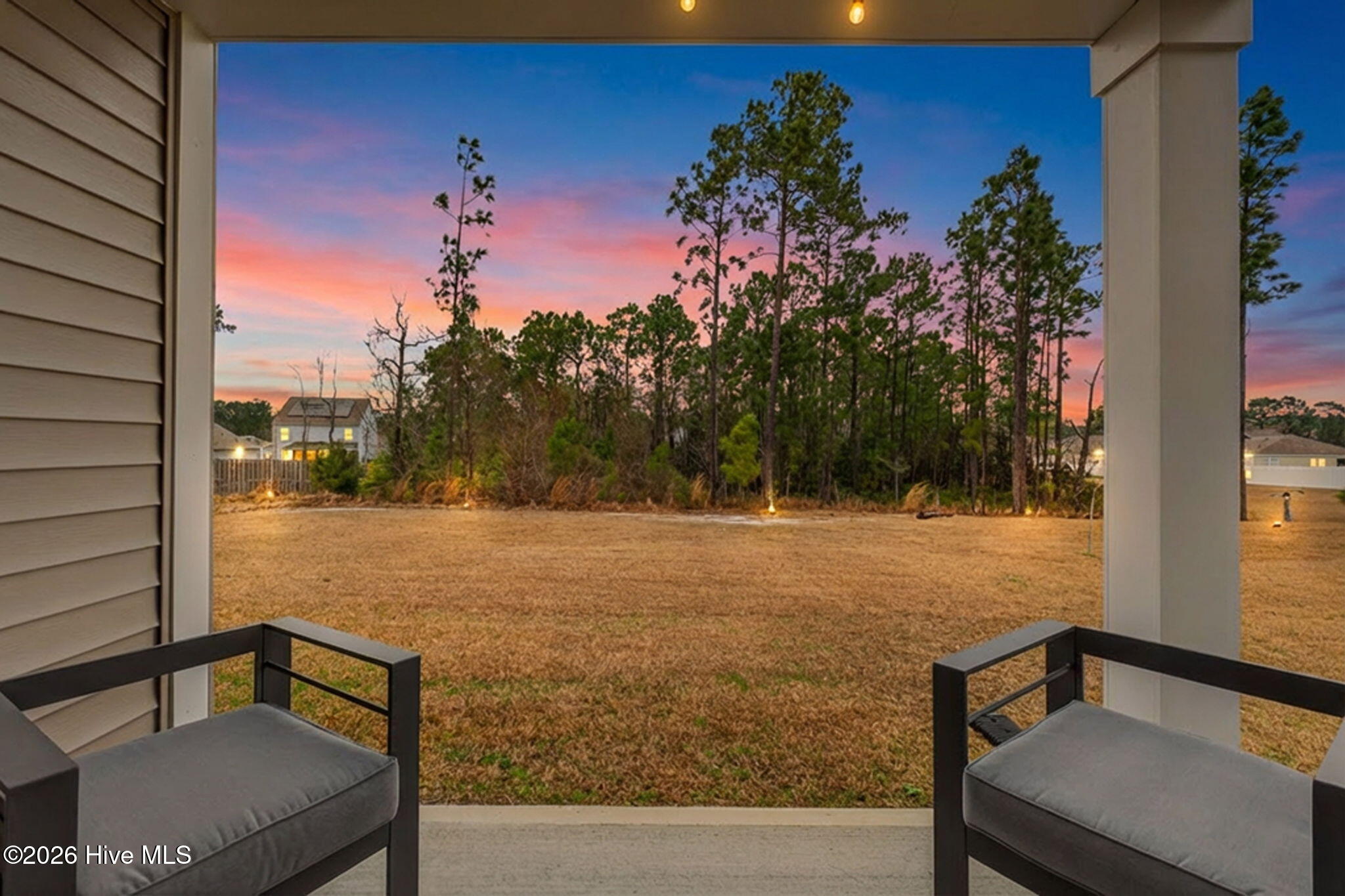 1108 Burled Oak Ridge Loop Southeast, Unit LOT 40 Bolivia, NC 28422 - Photo 31 of 46 Sunset view from patio