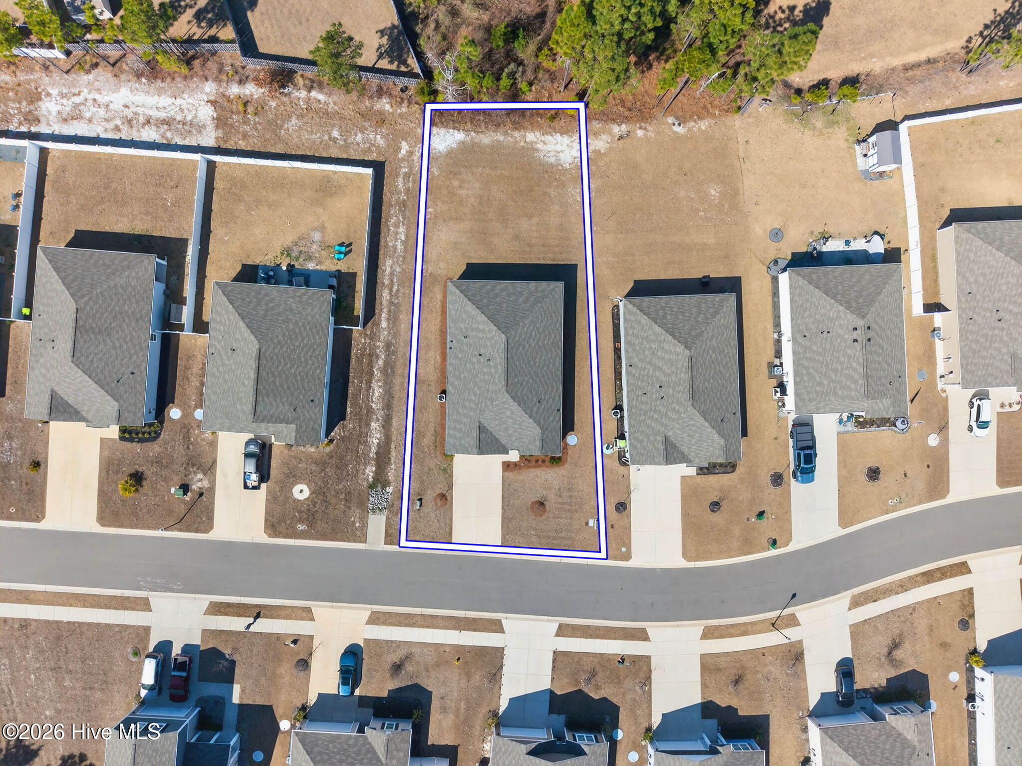 1108 Burled Oak Ridge Loop Southeast, Unit LOT 40 Bolivia, NC 28422 - Photo 3 of 46 .22-acre lot backed to wooded common area