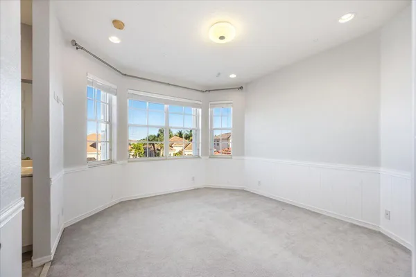 an empty room with windows