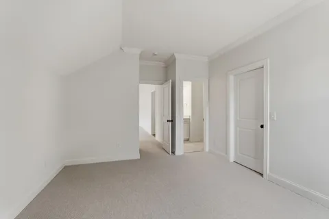 a view of room with window and ceiling fan