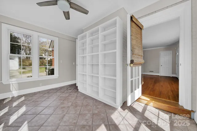 an empty room with windows