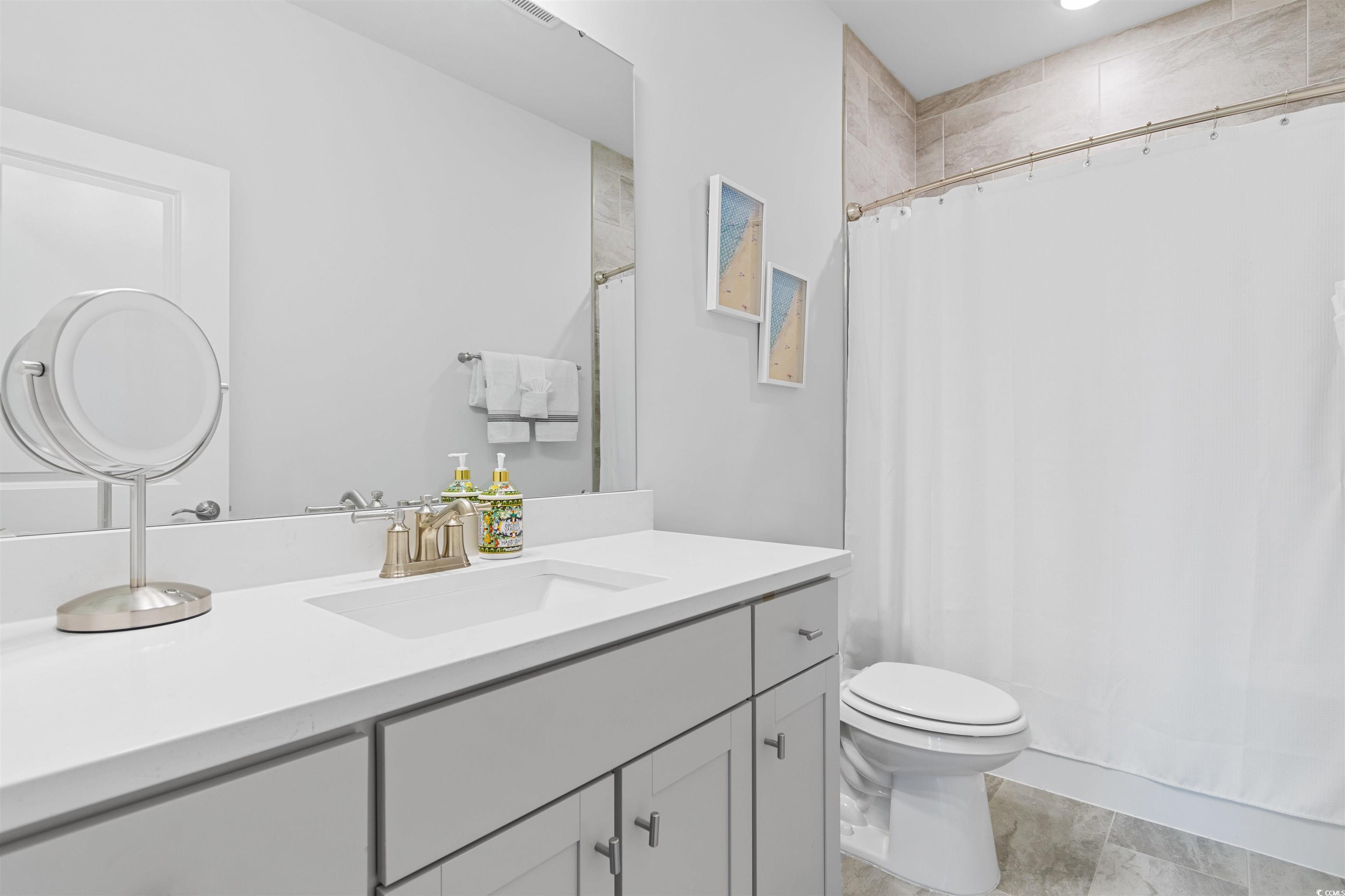 5117 Double Eagle Way North Myrtle Beach, SC 29582 - Photo 16 of 20 Bathroom with vanity and toilet