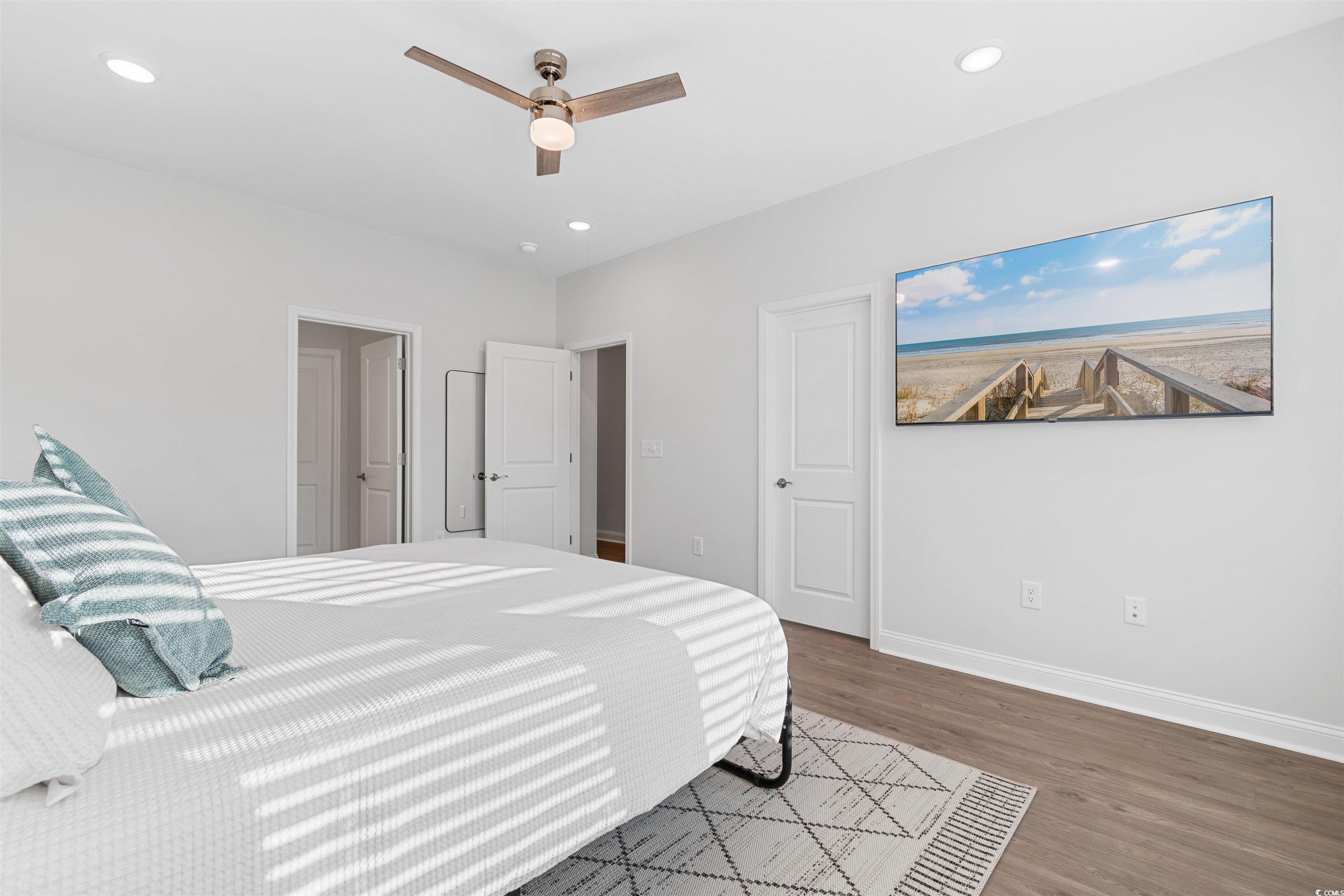 5117 Double Eagle Way North Myrtle Beach, SC 29582 - Photo 10 of 20 Bedroom featuring wood finished floors, ceiling fan, and recessed lighting