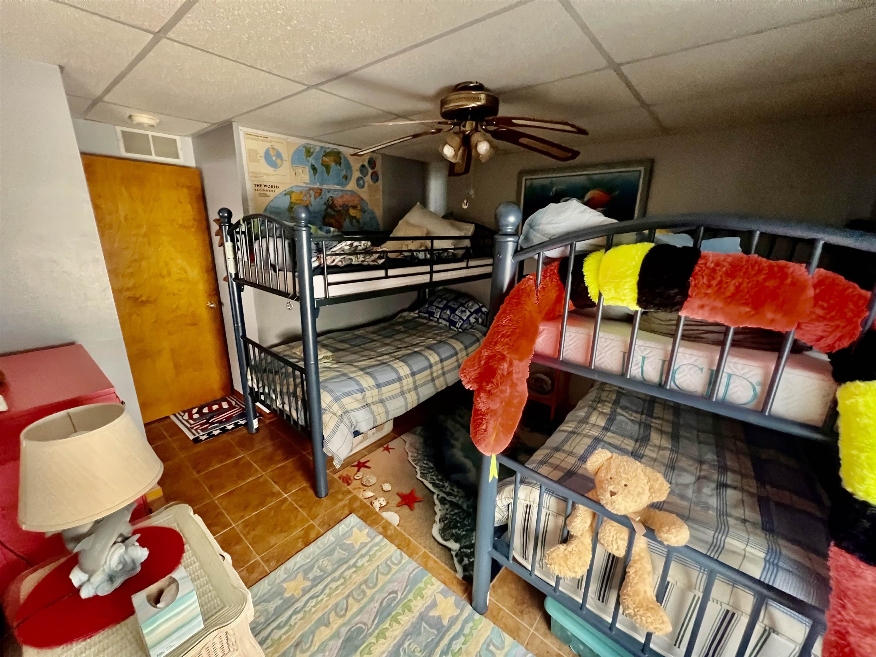 532 West Anglesea Drive, Unit A North Wildwood, NJ 08260 - Photo 17 of 28 a view of walk in closet with clothes and shoes