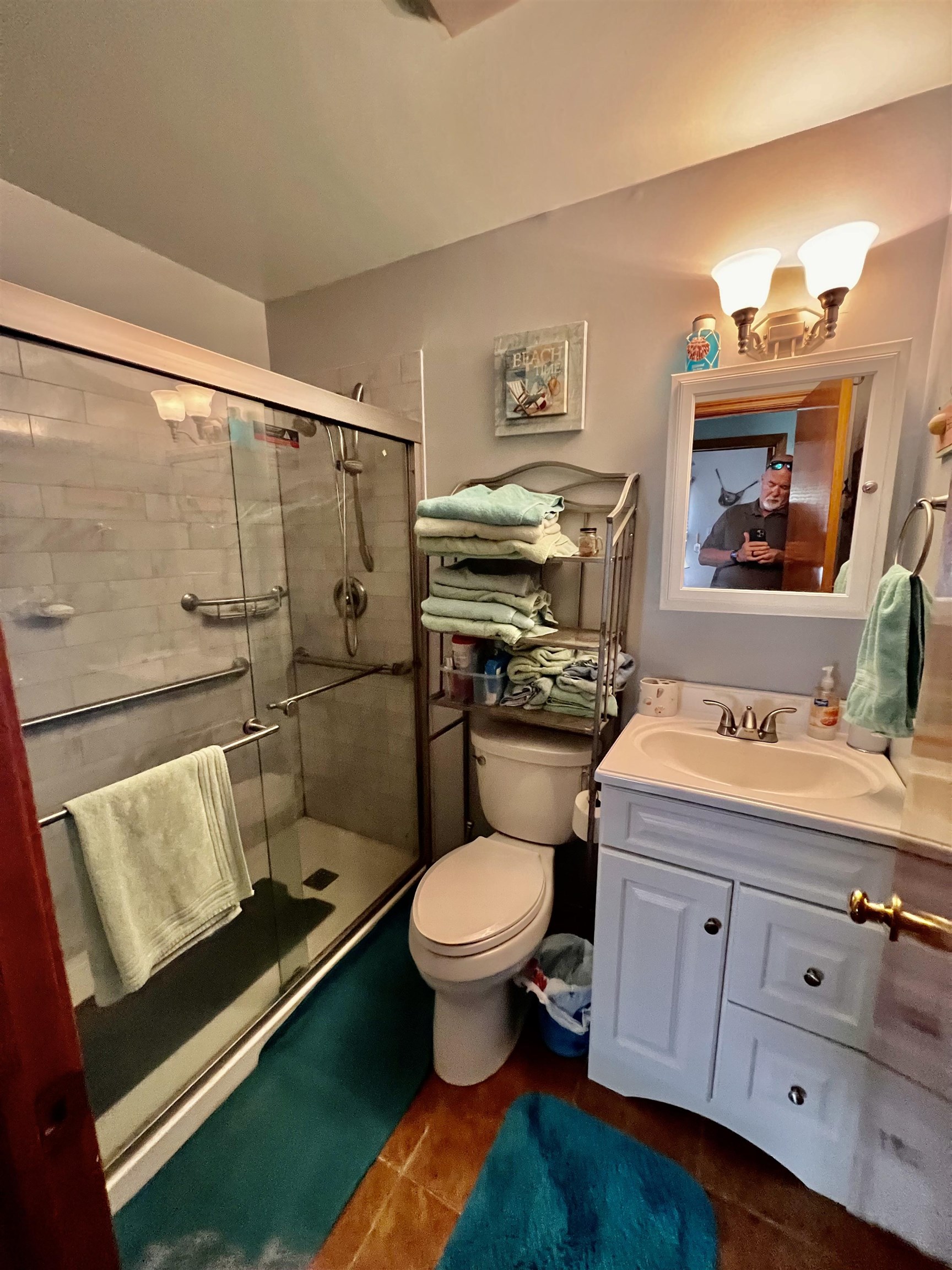 532 West Anglesea Drive, Unit A North Wildwood, NJ 08260 - Photo 20 of 28 a bathroom with a toilet sink and mirror