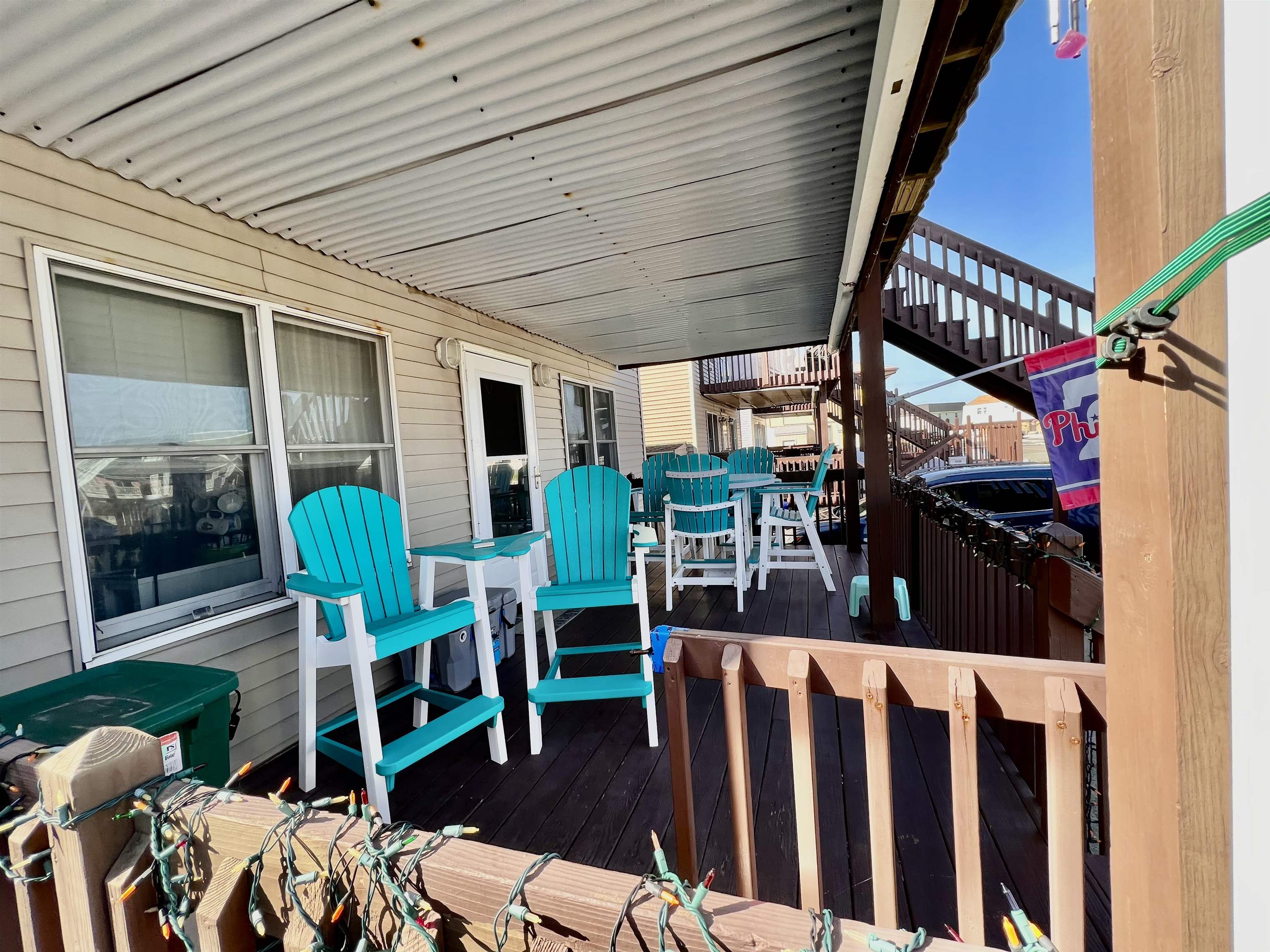 532 West Anglesea Drive, Unit A North Wildwood, NJ 08260 - Photo 3 of 28 a view of a chairs and table in patio
