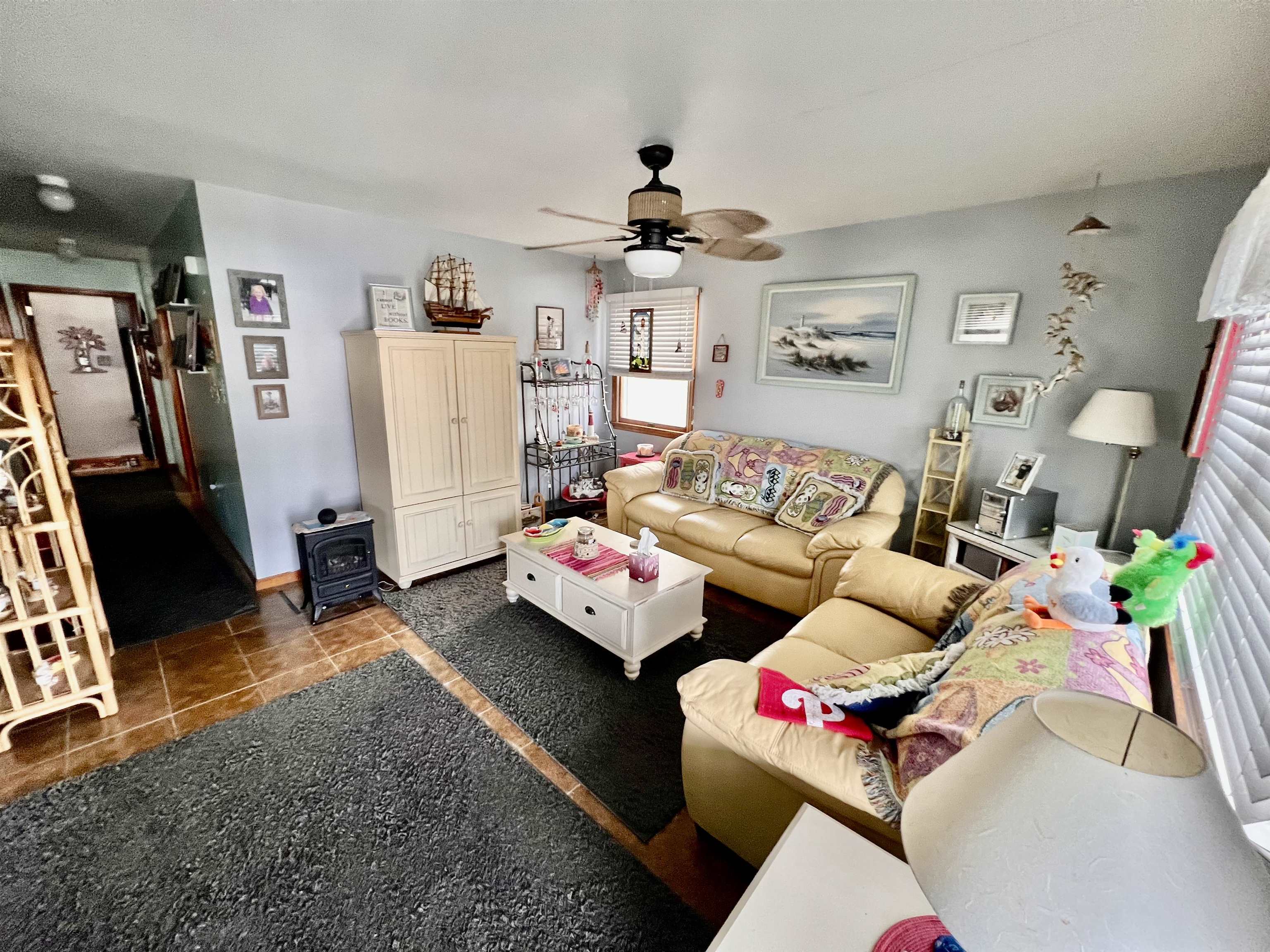 532 West Anglesea Drive, Unit A North Wildwood, NJ 08260 - Photo 5 of 28 a living room with furniture and a flat screen tv