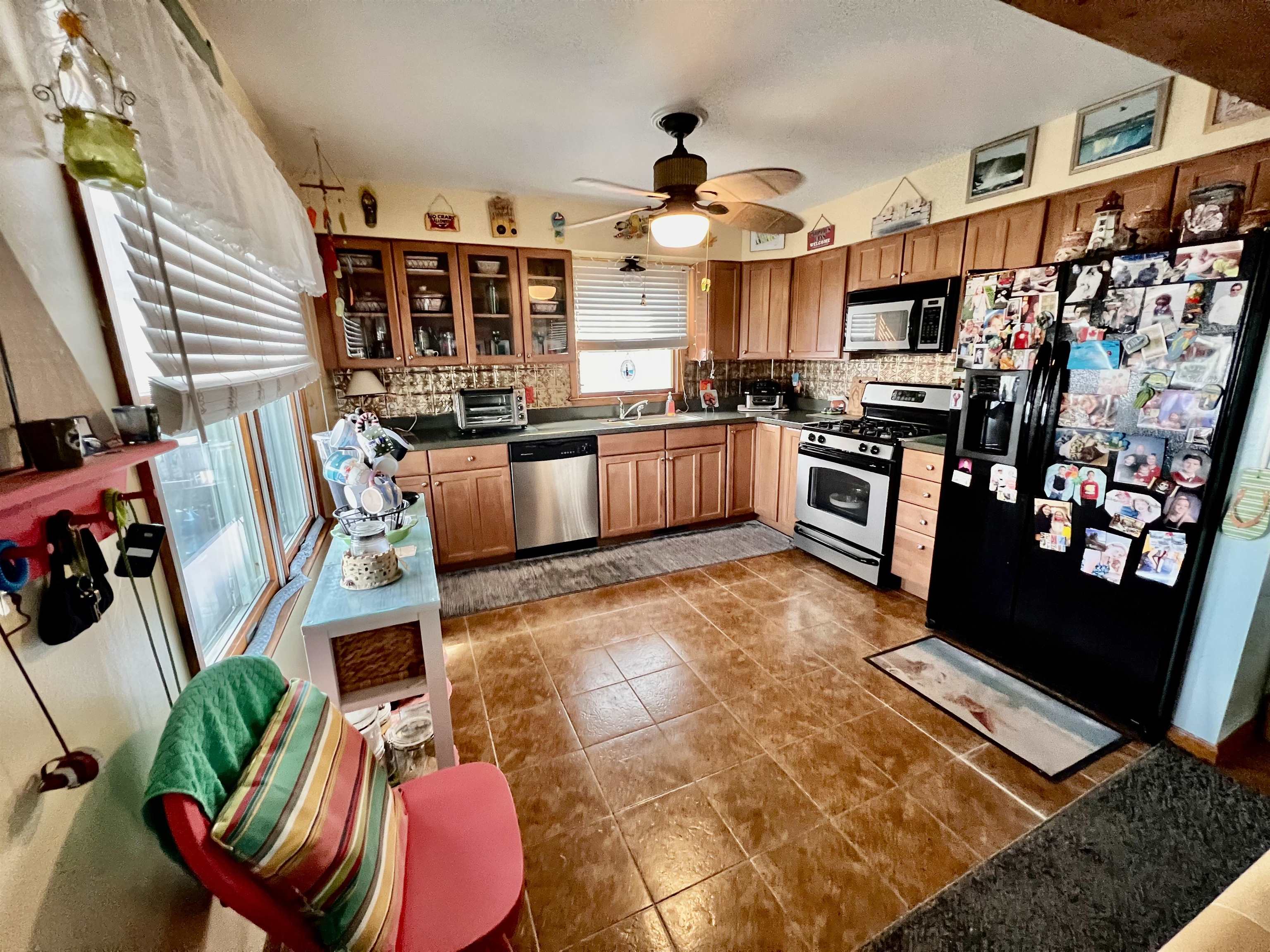532 West Anglesea Drive, Unit A North Wildwood, NJ 08260 - Photo 7 of 28 a large kitchen with stainless steel appliances kitchen island granite countertop a sink and cabinets
