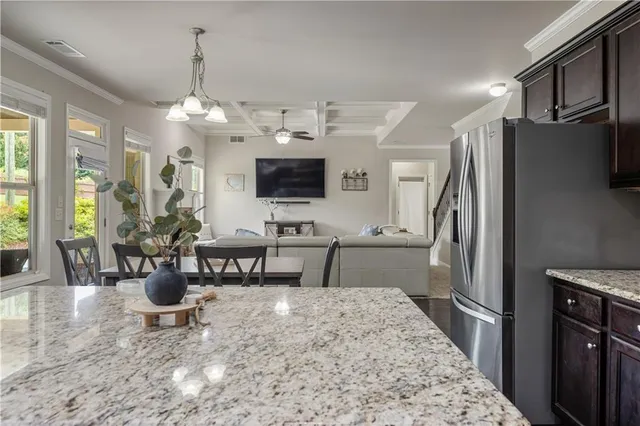 wooden floor with windows and stairs