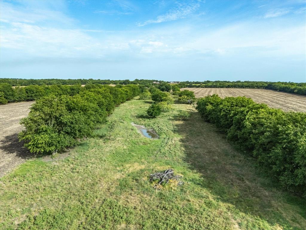 3506 County Road 1106 Rio Vista, TX 76093 - Photo 11 of 40 Aerial view of sparsely populated area with abundant farmland