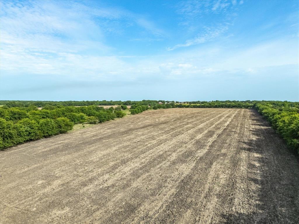 3506 County Road 1106 Rio Vista, TX 76093 - Photo 13 of 40 View of yard with a view of countryside and agricultural area